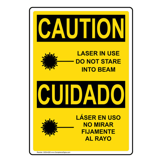 English + Spanish OSHA CAUTION Laser In Use Do Not Stare Beam Sign With Symbol OCB-4220