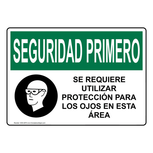 Spanish OSHA SAFETY FIRST Eye Protection Required In Sign With Symbol - OSS-2970