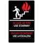Black ADA Braille IN CASE OF FIRE USE STAIRWAY English + Spanish Sign RRB-260_MULTI_White_on_Black