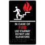 Black ADA Braille IN CASE OF FIRE USE STAIRWAY DO NOT USE ELEVATOR Sign with Symbol RRE-265_MULTI_White_on_Black