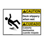 English + Spanish ANSI CAUTION Deck Slippery When Wet Sign With Symbol ACB-7748