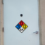 NFPA 704 Diamond Sign with 3-0-0-SA Hazard Rating for Carbon Dioxide on Exterior Door