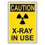 Portrait OSHA CAUTION X-Ray In Use Sign With Symbol OCEP-6685