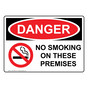 OSHA DANGER No Smoking On These Premises Sign With Symbol ODE-4800