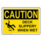 OSHA CAUTION Deck Slippery When Wet Sign With Symbol OCE-7748