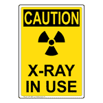 Portrait OSHA CAUTION X-Ray In Use Sign With Symbol OCEP-6685