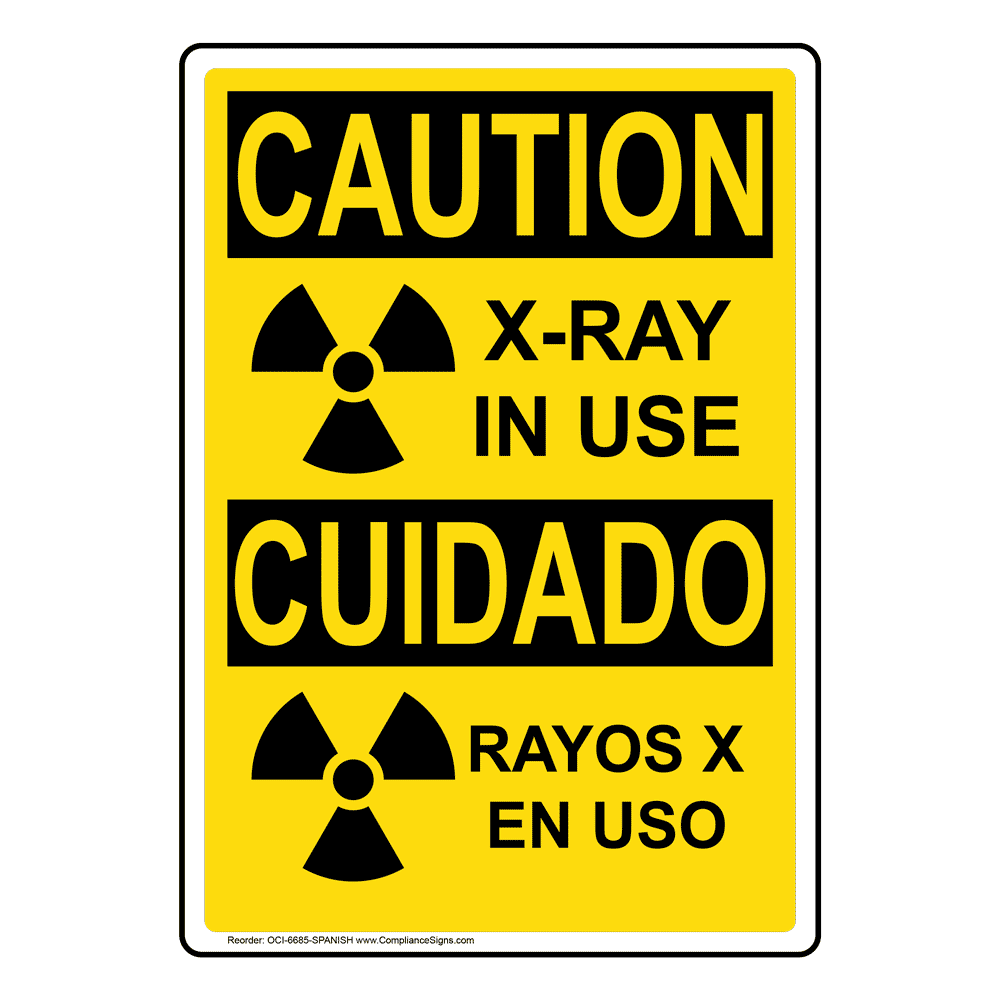English + Spanish Hazmat Sign XRay In Use Vertical